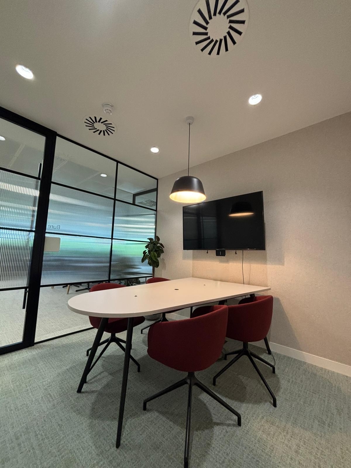 Finished Norwich workplace with coordinated lighting and room services