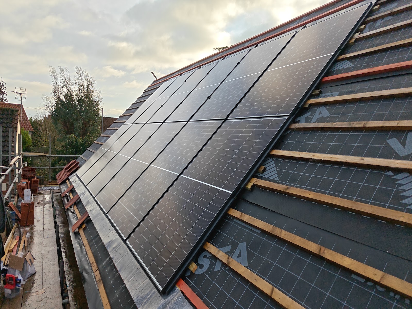 Solar photovoltaic panels installed on a Norfolk roof